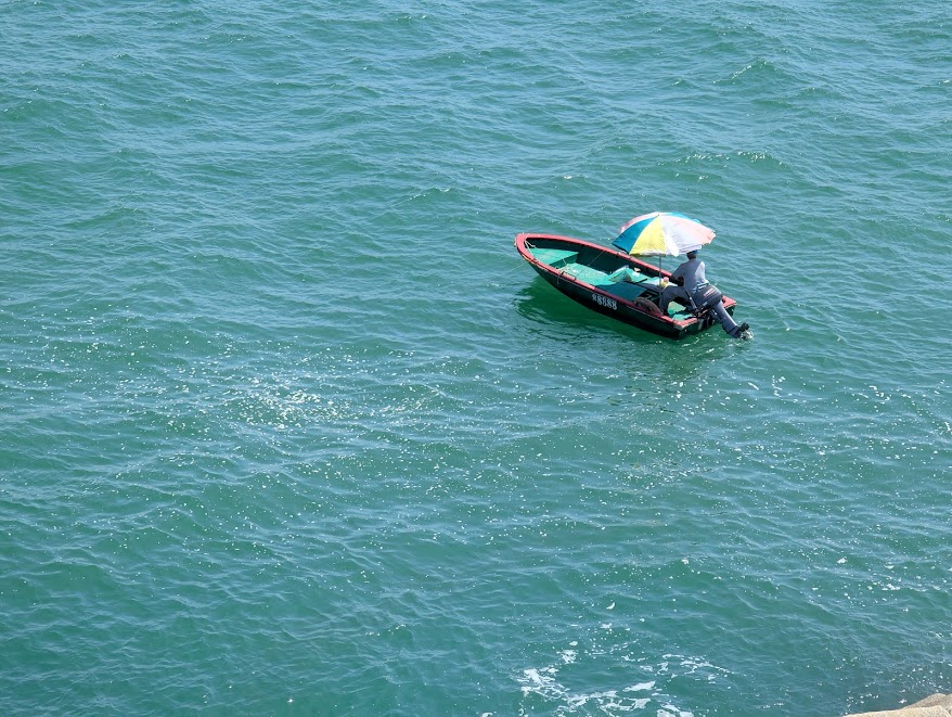 a man on a boat labeled 88888